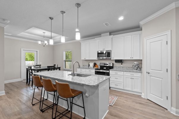Dining room, Interior, Kitchen, Pendant Lights, Recessed Lighting, Stainless Steel Appliances, Wood Texture Flooring