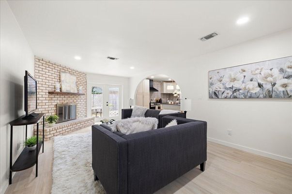 Fireplace, Interior, Kitchen, Living room, Recessed Lighting, Stone Walls, Wood Texture Flooring