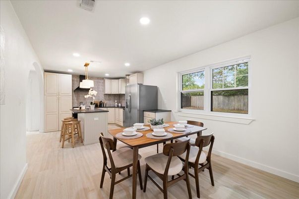 Dining room, Interior, Kitchen, Pendant Lights, Recessed Lighting, Stainless Steel Appliances, Wood Texture Flooring