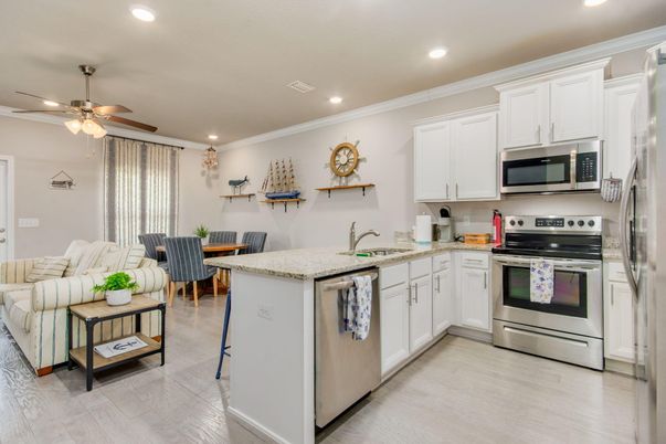 Dining room, Interior, Kitchen, Living room, Recessed Lighting, Stainless Steel Appliances, Wood Texture Flooring
