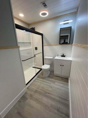 Bathroom, Glass Shower, Interior, Recessed Lighting, Wood Texture Flooring