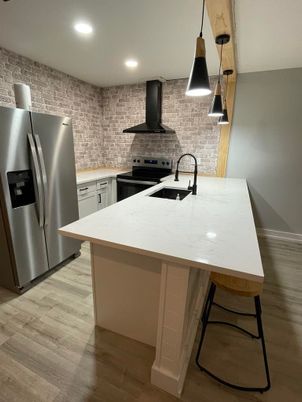 Interior, Kitchen, Pendant Lights, Recessed Lighting, Stainless Steel Appliances, Wood Texture Flooring