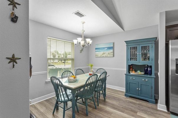 Chandelier, Dining room, Interior, Stainless Steel Appliances, Wood Texture Flooring