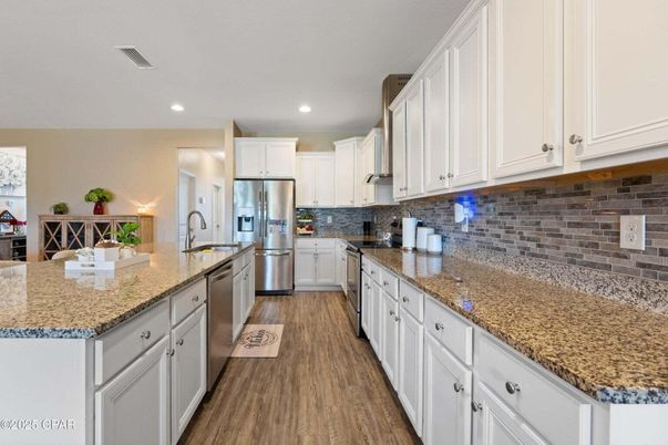 Interior, Kitchen, Recessed Lighting, Stainless Steel Appliances, Wood Texture Flooring