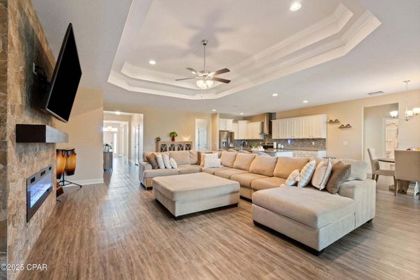 Dining room, Fireplace, Interior, Kitchen, Living room, Pendant Lights, Recessed Lighting, Stone Walls, Wood Texture Flooring