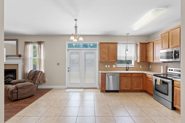 Fireplace, Interior, Kitchen, Pendant Lights, Stainless Steel Appliances