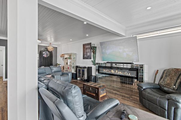 Chandelier, Fireplace, Interior, Living room, Recessed Lighting, Wood Texture Flooring