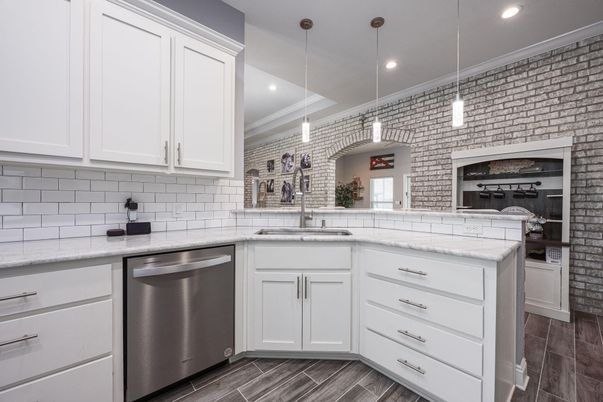 Interior, Kitchen, Pendant Lights, Recessed Lighting, Stainless Steel Appliances, Stone Walls, Wood Texture Flooring