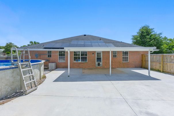 Exterior, Pool, Solar Panels