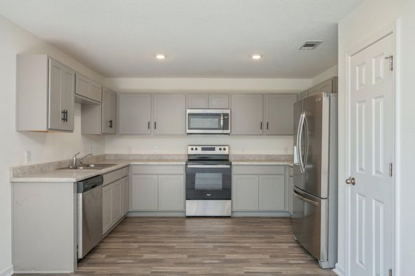 Interior, Kitchen, Recessed Lighting, Stainless Steel Appliances, Wood Texture Flooring