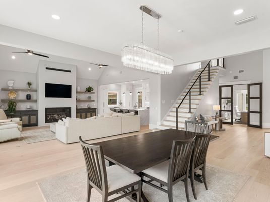 Chandelier, Dining room, Fireplace, Interior, Living room, Recessed Lighting, Wood Texture Flooring