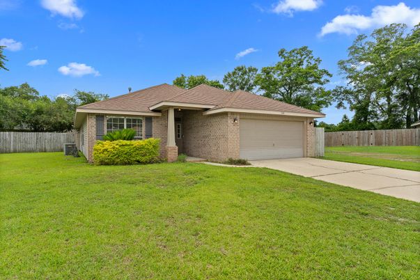 Attached, Backyard, Exterior, Facade, Brick Facade, Ranch