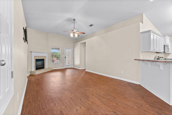 Empty room, Fireplace, Interior, Recessed Lighting, Wood Texture Flooring