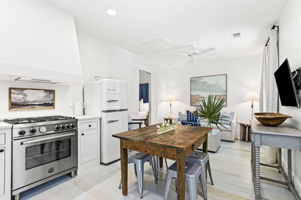 Dining room, Interior, Kitchen, Living room, Recessed Lighting, Stainless Steel Appliances, Wood Texture Flooring