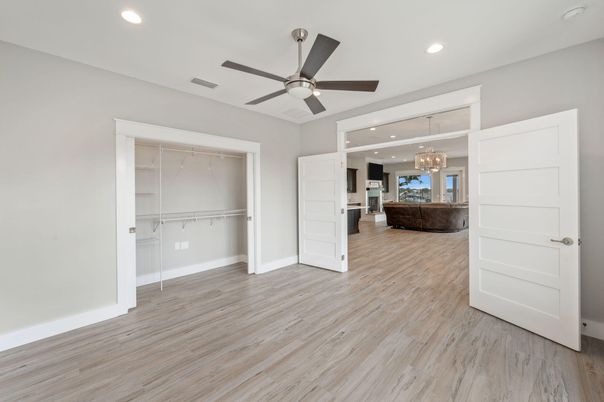 Chandelier, Empty room, Interior, Recessed Lighting, Wood Texture Flooring
