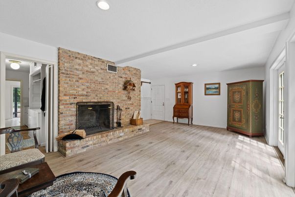 Fireplace, Interior, Recessed Lighting, Stone Walls, Wood Texture Flooring