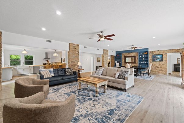 Dining room, Interior, Living room, Pendant Lights, Recessed Lighting, Stone Walls, Wood Texture Flooring