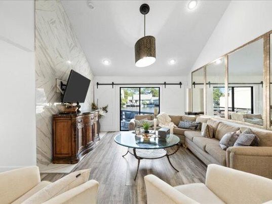 Interior, Living room, Marble Walls, Pendant Lights, Recessed Lighting, Wood Texture Flooring