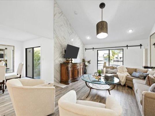 Interior, Living room, Marble Walls, Pendant Lights, Recessed Lighting, Wood Texture Flooring