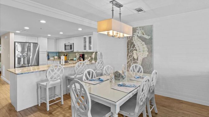 Chandelier, Dining room, Interior, Kitchen, Pendant Lights, Recessed Lighting, Stainless Steel Appliances, Wood Texture Flooring