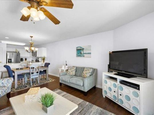 Chandelier, Dining room, Interior, Kitchen, Living room, Recessed Lighting, Stainless Steel Appliances, Wood Texture Flooring
