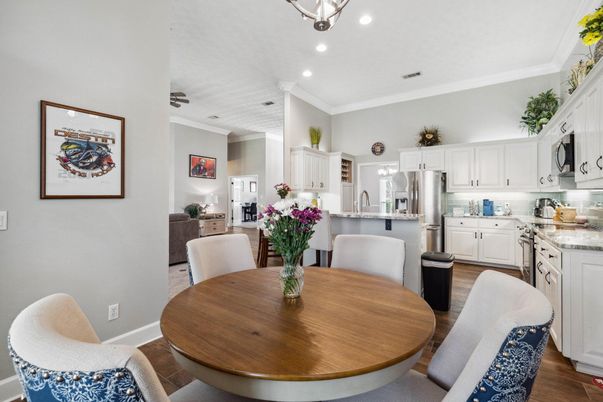 Dining room, Interior, Kitchen, Recessed Lighting, Stainless Steel Appliances, Wood Texture Flooring