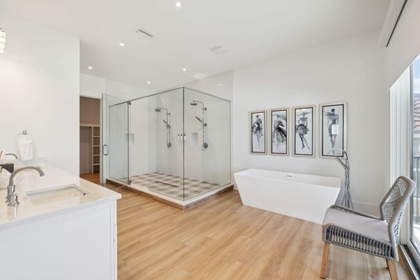 Bathroom, Free Standing Baths, Glass Shower, Interior, Recessed Lighting, Wood Texture Flooring