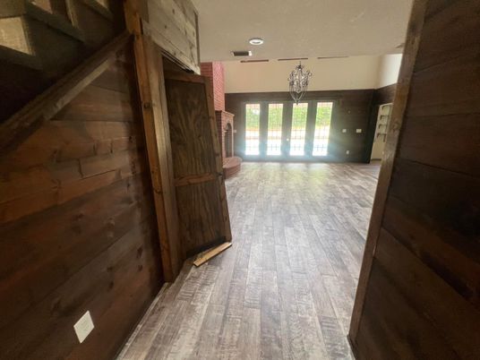 Empty room, Interior, Recessed Lighting, Stone Walls, Wood Texture Flooring