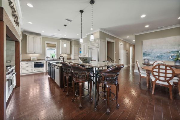 Dining room, Interior, Kitchen, Pendant Lights, Recessed Lighting, Stainless Steel Appliances, Wood Texture Flooring