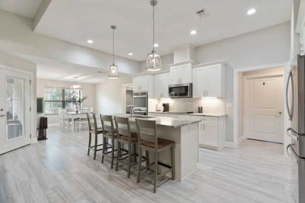 Dining room, Interior, Kitchen, Pendant Lights, Recessed Lighting, Stainless Steel Appliances, Wood Texture Flooring
