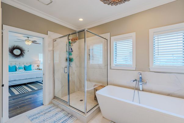 Bathroom, Bedroom, Free Standing Baths, Glass Shower, Interior, Marble Walls, Recessed Lighting, Wood Texture Flooring