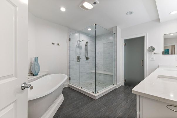 Bathroom, Dual Sink Vanities, Free Standing Baths, Glass Shower, Interior, Recessed Lighting, Wood Texture Flooring