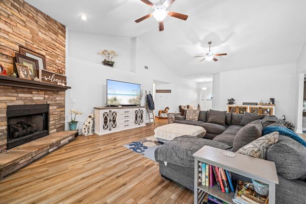 Fireplace, Interior, Living room, Recessed Lighting, Stone Walls, Wood Texture Flooring, Wooden Walls
