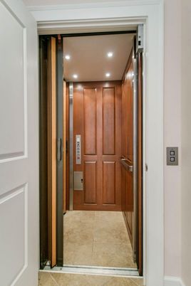 Elevator, Interior, Recessed Lighting, Wooden Walls