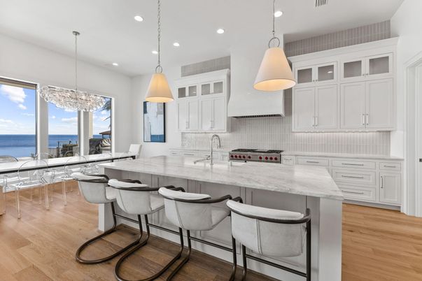 Dining room, Interior, Kitchen, Pendant Lights, Recessed Lighting, Stainless Steel Appliances, Water, Wood Texture Flooring