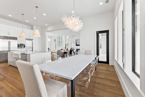 Chandelier, Dining room, Interior, Kitchen, Pendant Lights, Recessed Lighting, Stainless Steel Appliances, Wood Texture Flooring