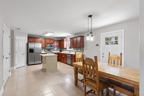 Dining room, Interior, Kitchen, Pendant Lights, Stainless Steel Appliances, Wood Texture Flooring