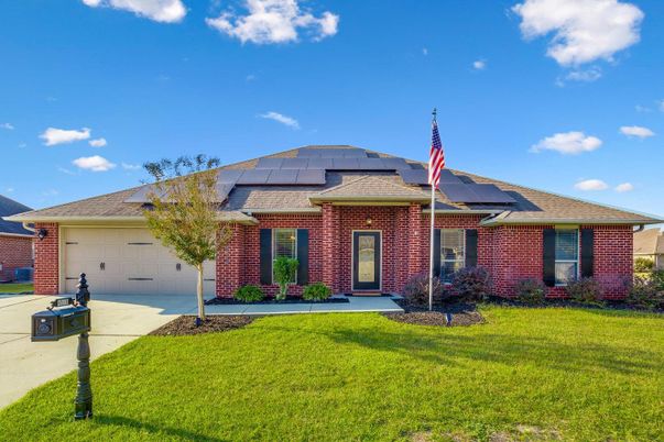 Attached, Exterior, Facade, Brick Facade, Solar Panels, Brick Traditional