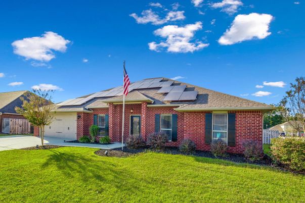 Attached, Exterior, Facade, Brick Facade, Solar Panels, Brick Traditional