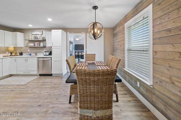 Dining room, Interior, Kitchen, Pendant Lights, Recessed Lighting, Stainless Steel Appliances, Wood Texture Flooring