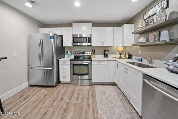 Interior, Kitchen, Recessed Lighting, Stainless Steel Appliances, Wood Texture Flooring