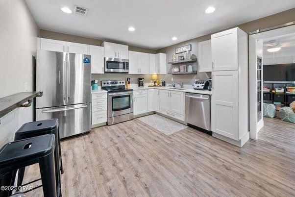 Interior, Kitchen, Recessed Lighting, Stainless Steel Appliances, Wood Texture Flooring