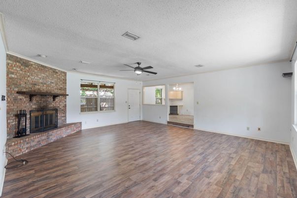 Empty room, Fireplace, Interior, Pendant Lights, Stone Walls, Wood Texture Flooring