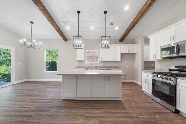 Chandelier, Empty room, Interior, Kitchen, Pendant Lights, Recessed Lighting, Stainless Steel Appliances, Wooden Beams, Wood Texture Flooring