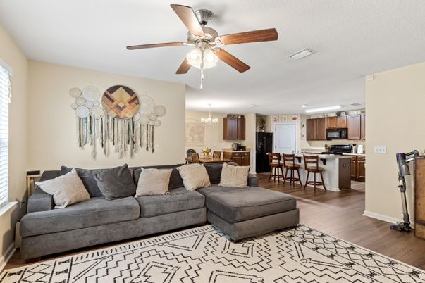 Chandelier, Dining room, Interior, Kitchen, Living room, Recessed Lighting, Stainless Steel Appliances, Wood Texture Flooring