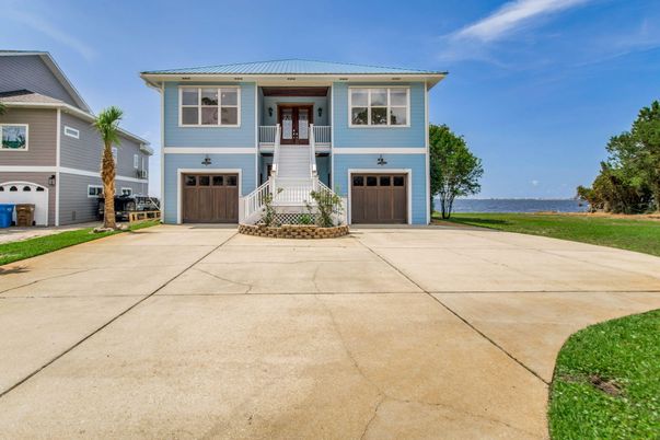 Attached, Exterior, Facade, Water, Raised Ranch