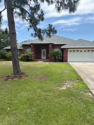 Attached, Backyard, Exterior, Facade, Brick Facade, Ranch