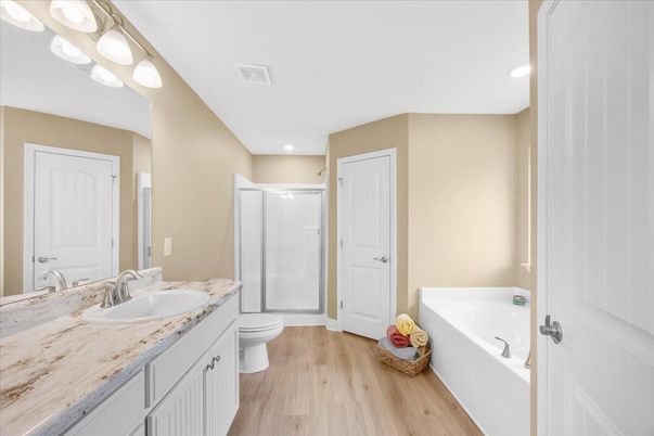 Bathroom, Dual Sink Vanities, Interior, Recessed Lighting, Wood Texture Flooring