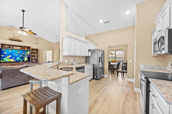 Dining room, Interior, Kitchen, Living room, Recessed Lighting, Wood Texture Flooring