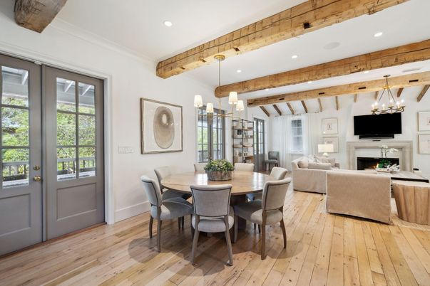 Chandelier, Dining room, Fireplace, Interior, Living room, Pendant Lights, Recessed Lighting, Wooden Beams, Wood Texture Flooring